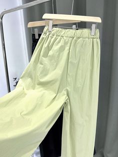 Sku CY-!120596 Material Chinlon , >50%Cotton Style Loose , Wide Leg Feature Pleated , Elasticity , Solid Color Occasion Casual , Simple , Vintage Seasons Spring , Summer , Autumn Type Pants , Trousers Color BLACK,LIGHT GREEN Size One_size Please consult the size chart we provide for this item's measurements to help you decide which size to buy.Please note: There may be 1-3cm differ due to manual measurement. Waist Hips Leg Opening Length One_size 64-88 126 58 105 Model's information : Weight : 50 KgHeight : 168 Cm (66.14 Inches)Bust : 86 Cm (33.86 Inches)Waist : 66 Cm (25.98 Inches)Hips : 90 Cm (35.43 Inches)Size : One-size Green Elastic Waistband Bottoms For Workwear, Green Bottoms With Elastic Waistband For Work, Green High-waisted Wide Leg Pants With Elastic Waistband, Green Solid Wide-leg Pants, Casual Green Wide Leg Pants For Spring, Green Solid Color Bottoms For Workwear, Trendy Baggy Green Wide Leg Pants, Trendy Green Baggy Wide Leg Pants, Green Solid Color Bottoms For Work