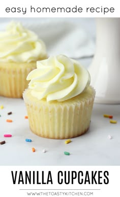 vanilla cupcakes with white frosting and sprinkles