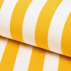 yellow and white striped fabric close up