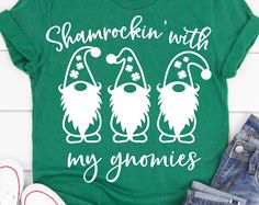 a green shirt that says shamrockin with my gnomies on it and two gnomes