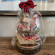 a basket filled with christmas treats on top of a wooden table