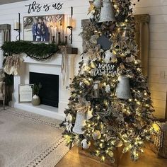 a christmas tree is decorated with silver and gold ornaments, while other holiday decorations are arranged around the fireplace