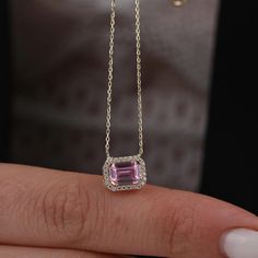 The "14K Gold Emerald Cut Pink Tourmaline Necklace" is a breathtaking piece of jewelry that radiates beauty and elegance. Adorned with a delicate pink emerald halo, this necklace exudes charm and sophistication. Perfect for Mother's Day or as a wedding gift, it symbolizes love, compassion, and femininity. With its dainty design and genuine 14K gold construction, this necklace is sure to be treasured as a timeless and meaningful accessory. Pendant Width: 0.37 inches / 9.40 mm Pendant Height: 0.30 Wedding Pink Gold Pendant Necklace, Elegant Pink Gold Necklace With Gemstone, Unique Pink Gemstone Necklace, Pink Gold Pendant Necklace With Gemstone, Pink Multi-stone Necklace For Gift, Pink Emerald, Halo Necklace, Solid Gold Chains, Tourmaline Necklace