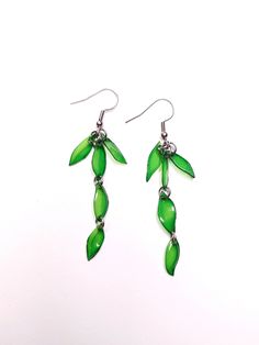 Green recycled plastic earrings with steel details Steel Detail, Plastic Earrings, Recycled Plastic, Festival Season, Jewelry Earrings Dangle, Etsy Earrings, Dangle Drop Earrings, Recycling, Dangle Earrings