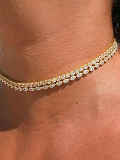 Premium Materials: Expertly crafted from high-quality 925 sterling silver over 14k gold plated or rhodium , ensuring durability and a radiant shine. ✨CUBIC ZIRCON STONES. Choker MEASURES 12.5-15.5 inches. Add a splash of color and elegance to your jewelry collection with our Diamond Pear Tennis Necklace. This exquisite bracelet features dazzling pear-shaped stones in a variety of vibrant hues, highlighted by stunning yellow gems. Perfect for any occasion, this piece effortlessly combines sophistication with a playful touch of color **Care Instructions To keep your necklace looking its best, avoid exposure to water, perfumes, and harsh chemicals. Store it in a cool, dry place when not in use. **Packaging Comes in a stylish jewelry box, ready for gifting. Let me know if there's anything you' Tennis Necklace Diamond, Tennis Jewelry, Yellow Gems, Tennis Necklace, Bridesmaid Necklace, Pear Diamond, Stylish Jewelry, Wedding Necklace, Color Splash