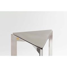 a metal table with a triangle shaped top