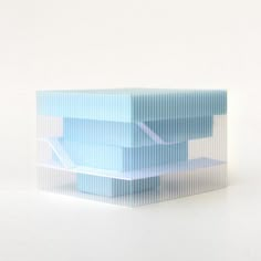 a blue box sitting on top of a white table