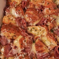 a casserole dish with ham and cheese