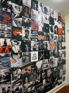 a wall with many pictures on it