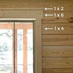 an open window with measurements for the size and width of the windows in front of it