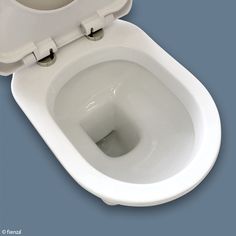 an open toilet bowl with the lid up and seat down, against a blue background