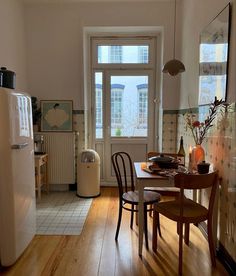 the kitchen is clean and ready to be used for cooking or dining, while also being used as a living room