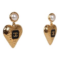 These Chanel Heart Shaped CC Earrings are in Black Enamel, Faux Pearl and Gold tone Metal. Origin: FranceCondition: New and never wornAccompanied by: Chanel boxMeasurements: 1" x 2.25" Designer Heart-shaped Formal Earrings, Designer Heart Shaped Earrings For Formal Occasions, Cc Earrings, Gold Heart Earrings, Gold Heart Earring, Best Bags, Earring Sale, Hermes Bags, Metal Earrings