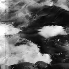 black and white photograph of water with clouds