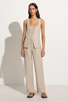 The Isotta Pants offer a fitted high-rise waist, straight leg shape, zip fly and front tucks for a tailored look. Crafted from 100% natural and responsibly sourced linen, the Isotta is a timeless wardrobe essential. Pair it with the Maya Vest for a matching tailored set. Restock arriving in early January 2024. Select your size and sign up with your email below to be notified first. Matching Vest And Pants Outfit, Deep Autumn, Vest Style, Timeless Wardrobe, Maxi Dress Sale, January 2024, Linen Style, Faithfull The Brand, Vest Fashion