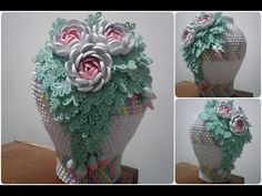 this is an image of a crocheted vase with flowers on it's sides