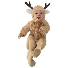 a baby dressed in a deer costume is flying through the air with its mouth open