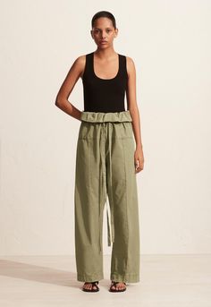 A pull-on fisherman style pant, featuring a drawcord channel with wide self-tie and a fold-over waistband, with wide-turned hem. Made from BCI cotton, these pants are garment dyed and washed for a worn and lived-in feel. They have a super relaxed vibe and are easily paired with our Ribbed Tank and Silba Sandal.100% BCI Cotton. Made in Turkey. Stefany is 177cm and wears the Fisherman Drawcord Pant in Oregano in a size 2. This style is true to size, take your regular size. Drawing Men, Fisherman Style, Fisherman Pants, Plunge Top, Style Pant, 2020 Style, Make Clothes, Spring Summer Wardrobe, Clothing Wishlist