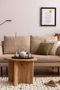 a living room scene with focus on the couch and coffee table in the foreground