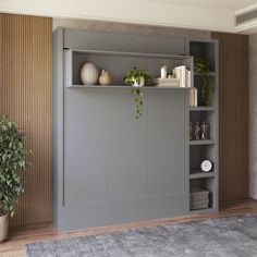 a living room with shelves and plants on the wall