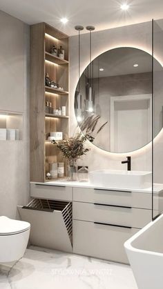 a bathroom with a white toilet sitting next to a sink and a large round mirror