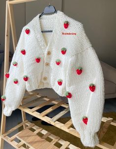 Cute strawberry cardigan with you!❤️ %100% handmade and strawberry carefully sewn. There is no nylon in the rope we use in our cardigan. This soft cardigan will be a great gift to yourself and your loved ones. 🍓  If you want to change the color of the cardigan, the buttons or the strawberry colors, you can send me a message. I will always be here to communicate and meet you. 💬  - PACKAGING - We support protecting nature. we use recyclable packages. Handmade accessories suitable for the model are sent to our valued customers free of charge. The products are packaged and sent to you without any damage. I prepare gift packages upon your request. I can get you a women day special package and any note you want. this will be the sweetest gift🎁🍄 - WASHING AND STORAGE - Wash at 30 degrees maxi Strawberry Cardigan, Strawberry Sweater, Strawberry Outfit, Crochet Sweater Design, Handmade Wardrobe, Cute Cardigans, Cute Strawberry, Soft Cardigan, Red Strawberry