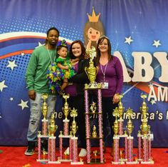 the family is posing with their trophies at the baby's america awards in las vegas