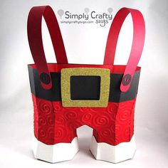 an origami santa clause bag made out of paper