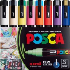 the different colors of posca pens are in front of each other, and one is black