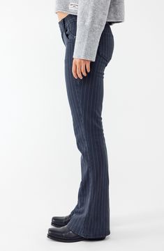 Sleek pinstripes cover these stretchy low-rise jeans designed with with kicky flared legs that add to the throwback style. Exclusive retailer Zip fly with button-tab closure Five-pocket style 93% cotton, 5% elastomultiester, 2% elastane Machine wash, line dry Made in Turkey Pinstripe Straight Leg Bottoms For Fall, Fitted Pants With Vertical Stripes For Fall, Fitted Straight Leg Bottoms With Vertical Stripes, Fitted Bottoms With Vertical Stripes And Straight Leg, Trendy Fitted Pinstripe Pants, Stretch Flare Striped Pants, Striped Stretch Flare Pants, Striped Fitted Straight Leg Jeans, Striped Fitted Wide Leg Jeans