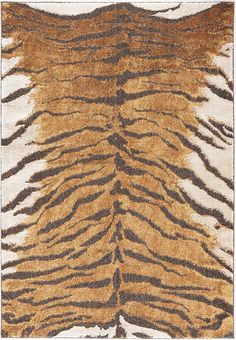 an animal print rug with brown and black stripes