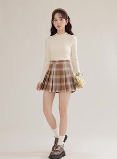 Pleated mini tennis skirt in our toasted plaid pattern. Concealed side zipper. Lined with safety shorts. S: 25" waist, 14.5" lengthM: 26.5" waist, 14.5" lengthL: 28" waist, 15" lengthXL: 29.5" waist, 15" length Preppy Short Mini Skirt For Fall, Preppy Lined Skort For Fall, Preppy Lined Tennis Skirt For Fall, Fall Preppy Lined Tennis Skirt, Preppy Mini Tennis Skirt For Fall, Plaid Skirted Skort For Fall, Plaid Pleated Short Skort, Fall School Mini Skort, Preppy Plaid Mini Skirt For Fall