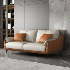 a living room with a couch, chair and bookcase in the middle of it