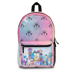 Disney It's a Small World Backpack. Perfect for every day use or trips to the theme parks! Also a unique and adorable bag for school! Got space? With our roomy and durable backpack, you will have plenty! This bag is made from spun polyester and weights 1.3 lbs - just enough to be light, strong and long-lasting. Grab it, stow it, throw it onto the seat next to you, this backpack can take it, and so will you, wherever you go!  Each backpack is custom made to order. Production averages 2-5 business Themed Student Backpack, Themed Backpack For School, Themed Standard Backpack For School, Disney Bags For Everyday Use And Back To School, Themed Backpack For Back To School, Themed School Backpack, Disney Backpack For Daily Use And Back To School, Disney Backpack With Adjustable Strap For Back To School, Disney Travel Backpack