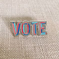 Does it get any more straightforward than our VOTE enamel pin?! Wear your voting efforts proud and remind the rest to get out and vote! Add one to your jacket, sweater, dress, lapel, hat, scarf, anything!  Save when you buy 2 - one for you and one for a friend! Or, buy the whole set of our 9 Vote pins and spread the word even more!  All designs may also be purchased separately in our companion listings. Check 'em out! * Original designs * 1.5" * Soft enamel pin * Secure rubber clutch * Silver-co Protest Pins, Sorority Pins, Chicago Gifts, Chicago Flag, Black Pins, Soft Enamel Pins, Jacket Sweater, Enamel Lapel Pin, Hat Scarf