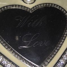 a heart shaped mirror with the words wish love written on it