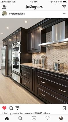 the instagram page shows an image of a kitchen with dark cabinets and stainless steel appliances