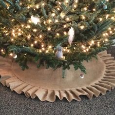 a christmas tree skirt with lights on it