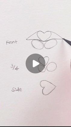 someone is drawing hearts with pencils on the sheet of paper that says front and side