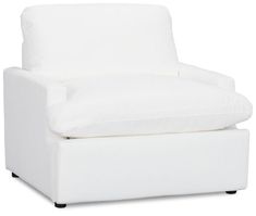 a white chair with a pillow on top of it