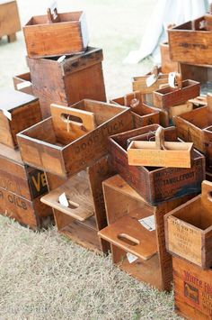 many wooden crates stacked on top of each other