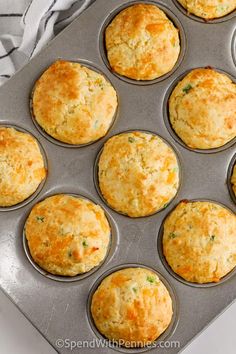 a muffin tin filled with freshly baked cornbread muffins