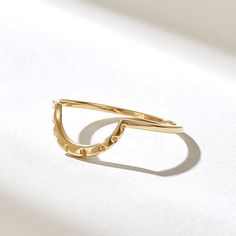 Elevate your style with our Minimalist Curved Nesting Ring from Norm Jewels. Crafted in 14k Solid Gold, this Basic Arch Stacking Ring adds a touch of elegance to any outfit. It's a dainty, thin contour ring for women, perfect for enhancing your style with its understated beauty. Features * Made to Order. * Gold KT: 10K, 14K, 18K * Custom Gold Color: Rose Gold, Yellow Gold, White Gold * Width of Band: 0.95MM * Thickness of Band: 1.15MM * Ready to Ship in 5-7 Business Days ✓ We care about the environment,the jewelry we cast is made with recycled gold. We source exclusively post-consumer material that is refined back to their pure elements to ensure that the gold is in the same quality. Our designs are made from 14k/18k/10k real solid gold ✓ We care about customer satisfaction and long-term r Nesting Ring, Curved Wedding Ring, Contour Ring, Contour Wedding Band, Beauty Features, Gold Rings Stackable, Stacking Bands, Curved Wedding Band, Ring Simple