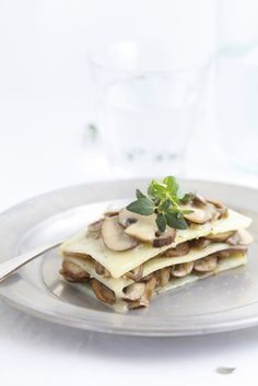 a white plate topped with food on top of a table