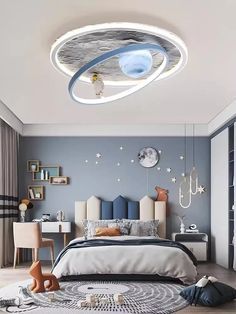 a bedroom with blue walls and white bedding has a circular light fixture above the bed