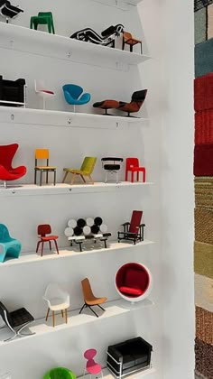 the shelves are filled with colorful chairs and rugs