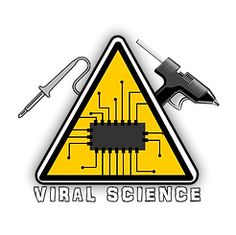 a sign that says virtual science next to a wrench and screwdriver on top of it