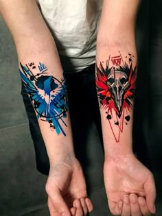 two people with matching tattoos on their arms