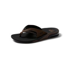 PRICES MAY VARY. FANNING MEN'S SANDALS: Reef's best selling flip flops for men with a bottle opener in the sole of the sandal. They are handcrafted with a comfortable footbed and anatomical arch support. BOTTLE OPENER: Use the church key bottle opener integrated into the rubber outsole giving you thirst quenching technology (TQT) on the go. REEF is the only men's sandal with a bottle opener. ARCH SUPPORT: Anatomical arch support flip flops for men give you a refreshing feel of satisfaction every Absorbing Man, Key Bottle Opener, Arch Support, Kids Luggage, Mens Sandals, Special Features, People Around The World, Pharmacy Gifts, Black And Tan