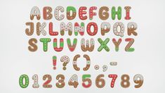 the letters and numbers are made up of different types of doughnuts on white paper